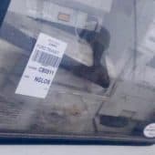 UNU - étude déchet électronique Nigeria - vitre d'une voiture d'occasion remplie de DEEE